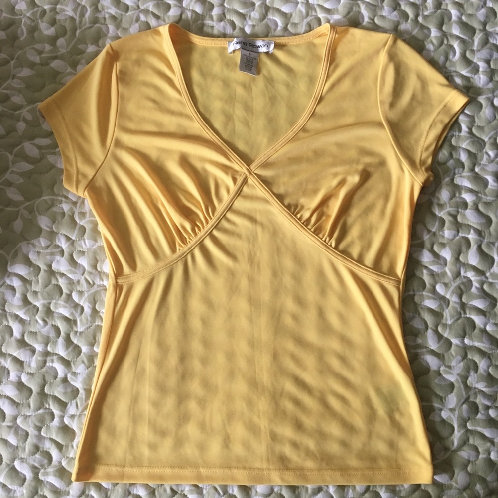 Rena Rowan S yellow blouse